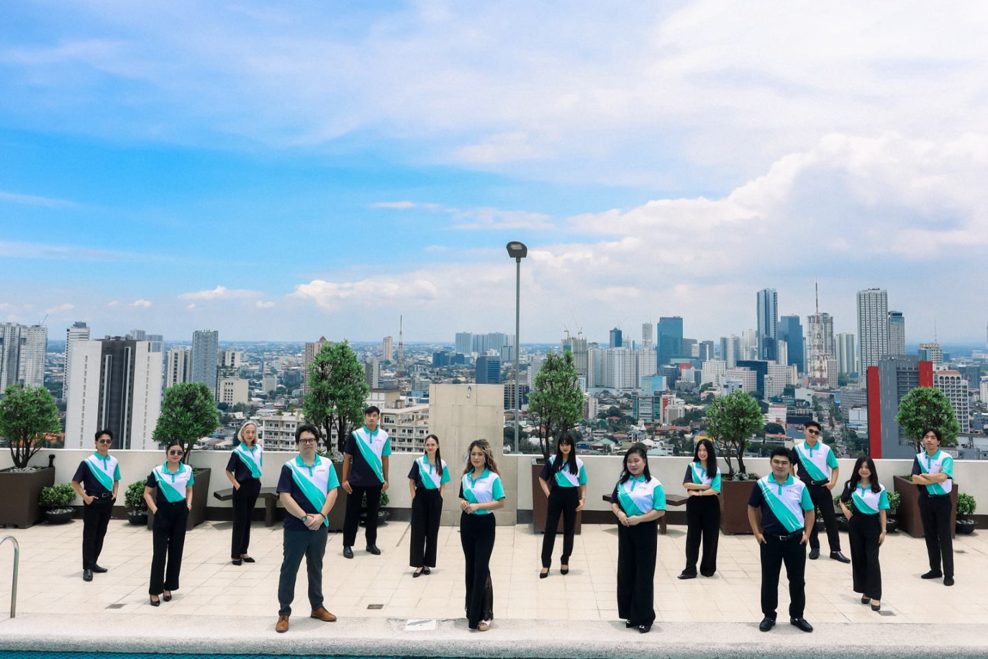 AMAC team members overlooking the city skyline